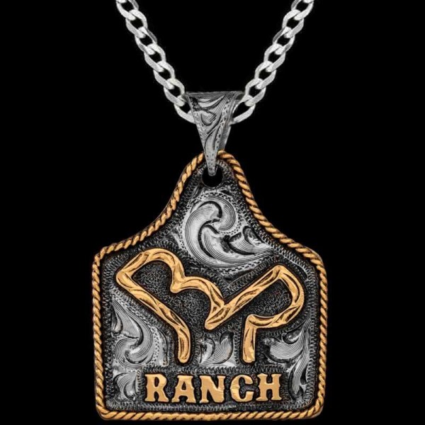 Shadow, German Silver base measures 1.75"x1.50" with a touch of our classic antique. Jewelers Bronze rope edge and Ranch Logo. 

Chain not in